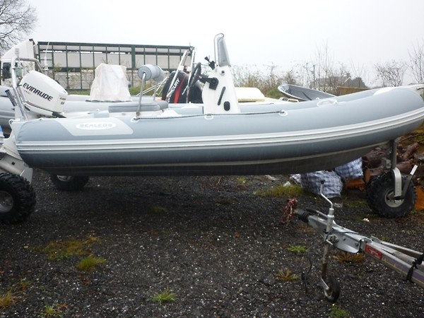 Sealegs amphibious RIB with hydraulic legs and wheels